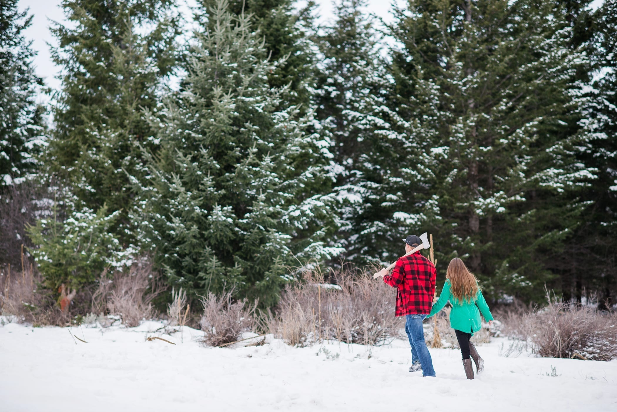 Cutting Down a Christmas Tree Anniversary Session by Michelle & Logan