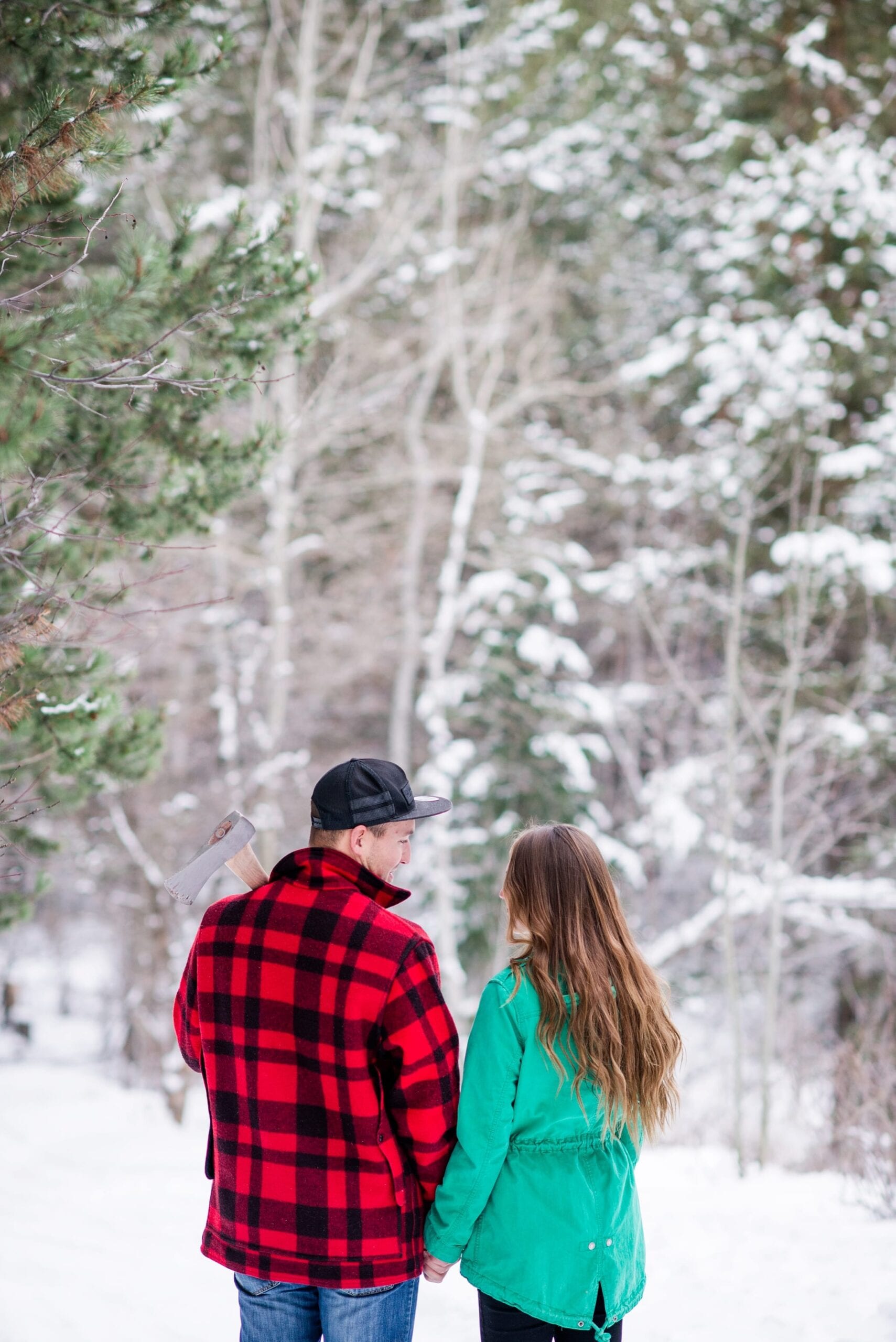 Cutting Down a Christmas Tree Anniversary Session by Michelle & Logan