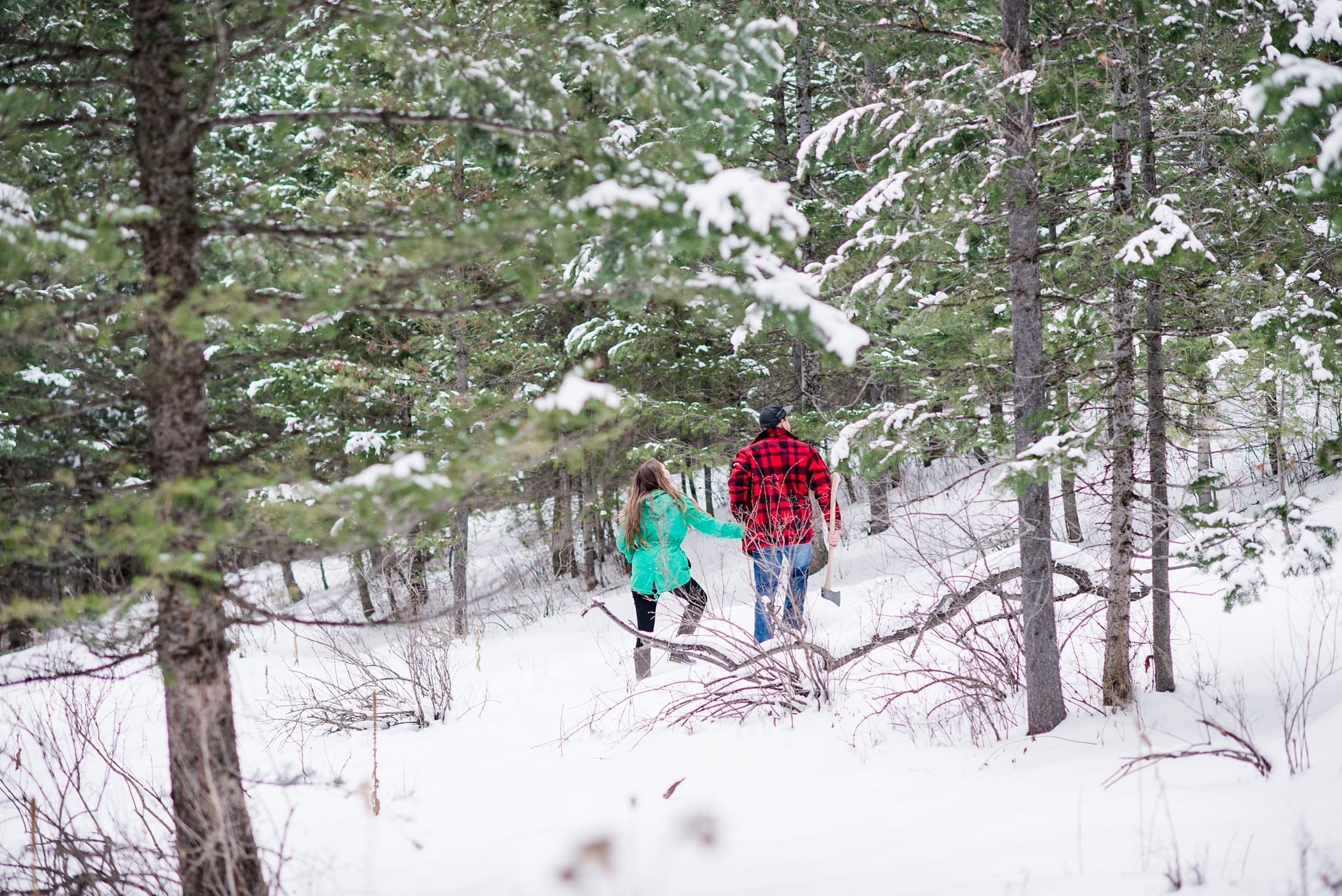 Cutting Down a Christmas Tree Anniversary Session by Michelle & Logan