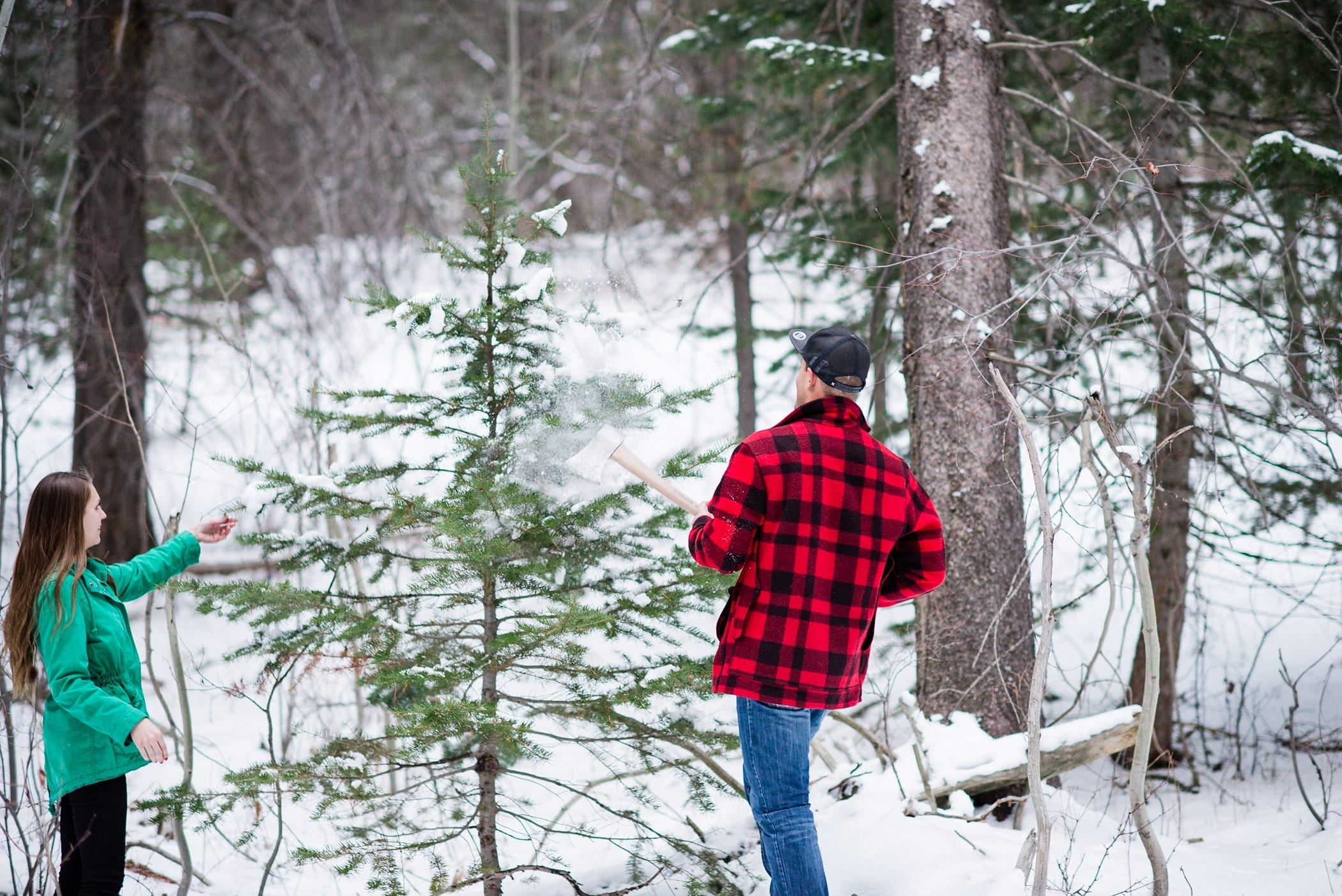 Cutting Down a Christmas Tree Anniversary Session by Michelle & Logan