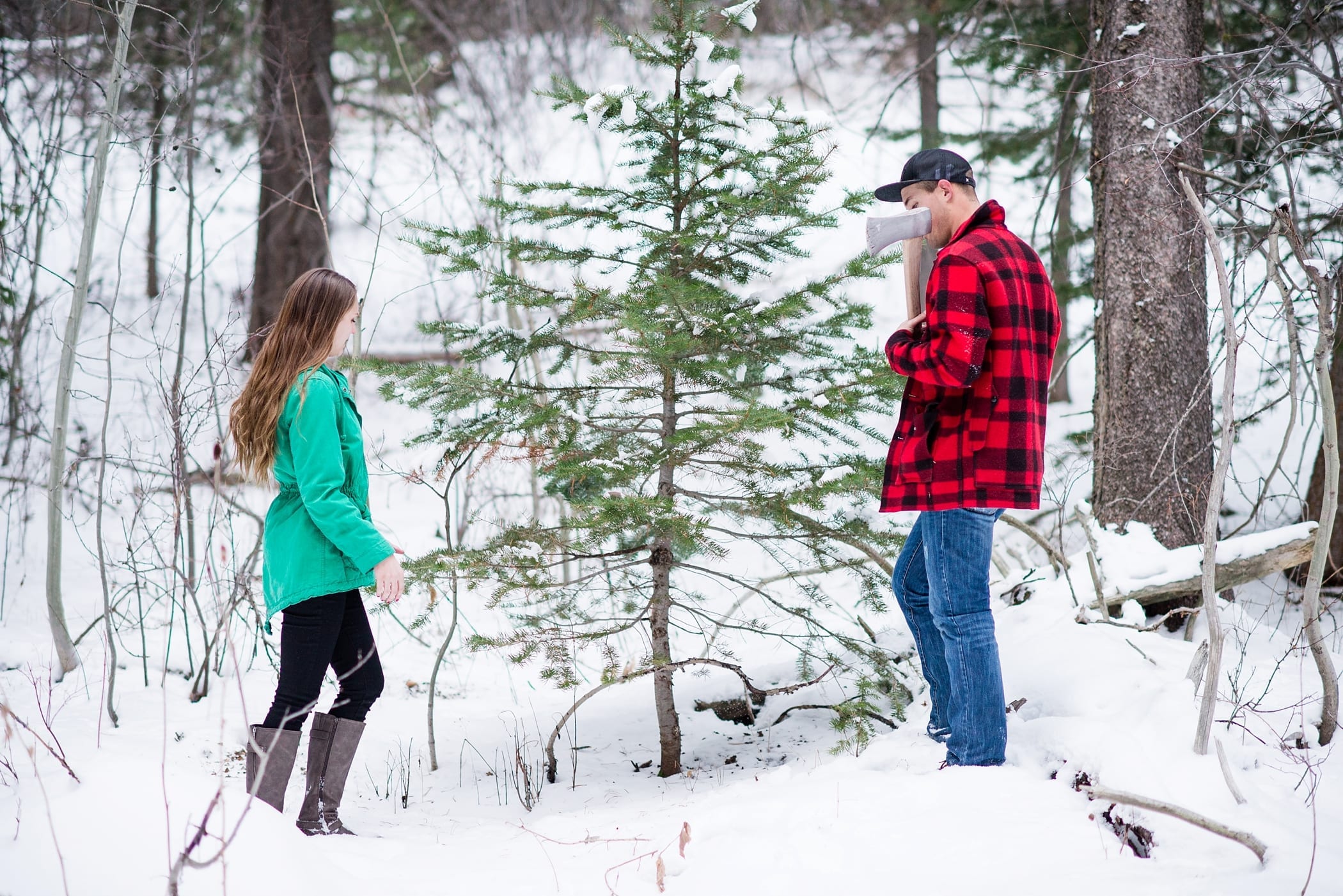 Cutting Down a Christmas Tree Anniversary Session by Michelle & Logan