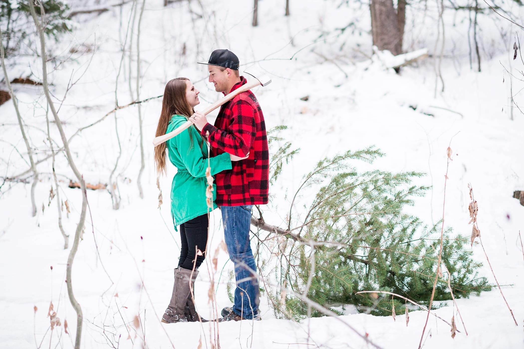 Cutting Down a Christmas Tree Anniversary Session by Michelle & Logan