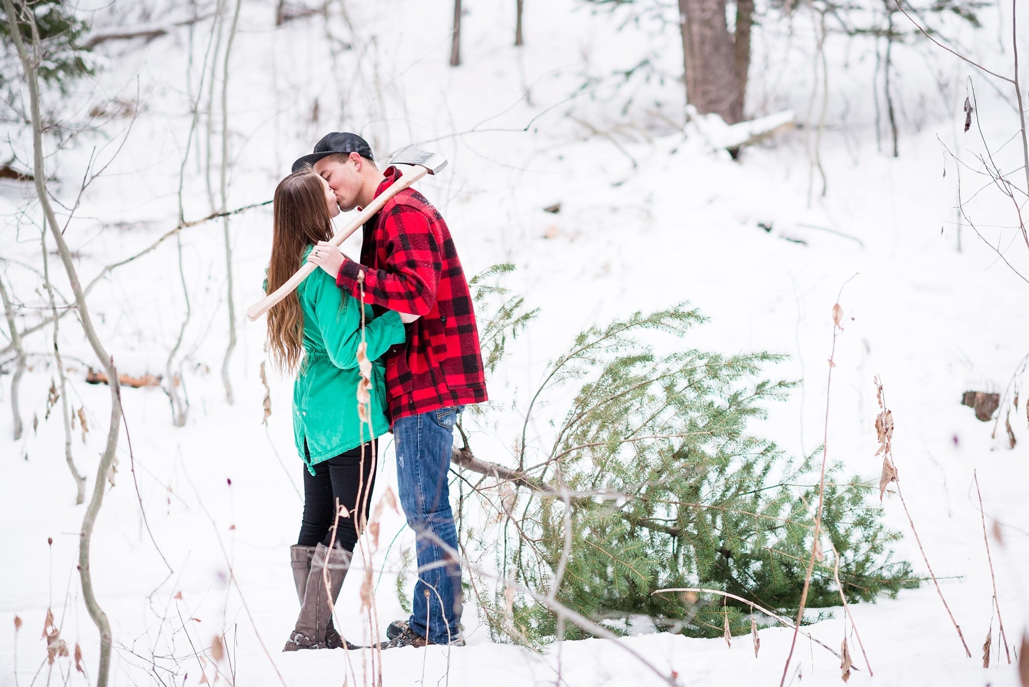 Cutting Down a Christmas Tree Anniversary Session by Michelle & Logan