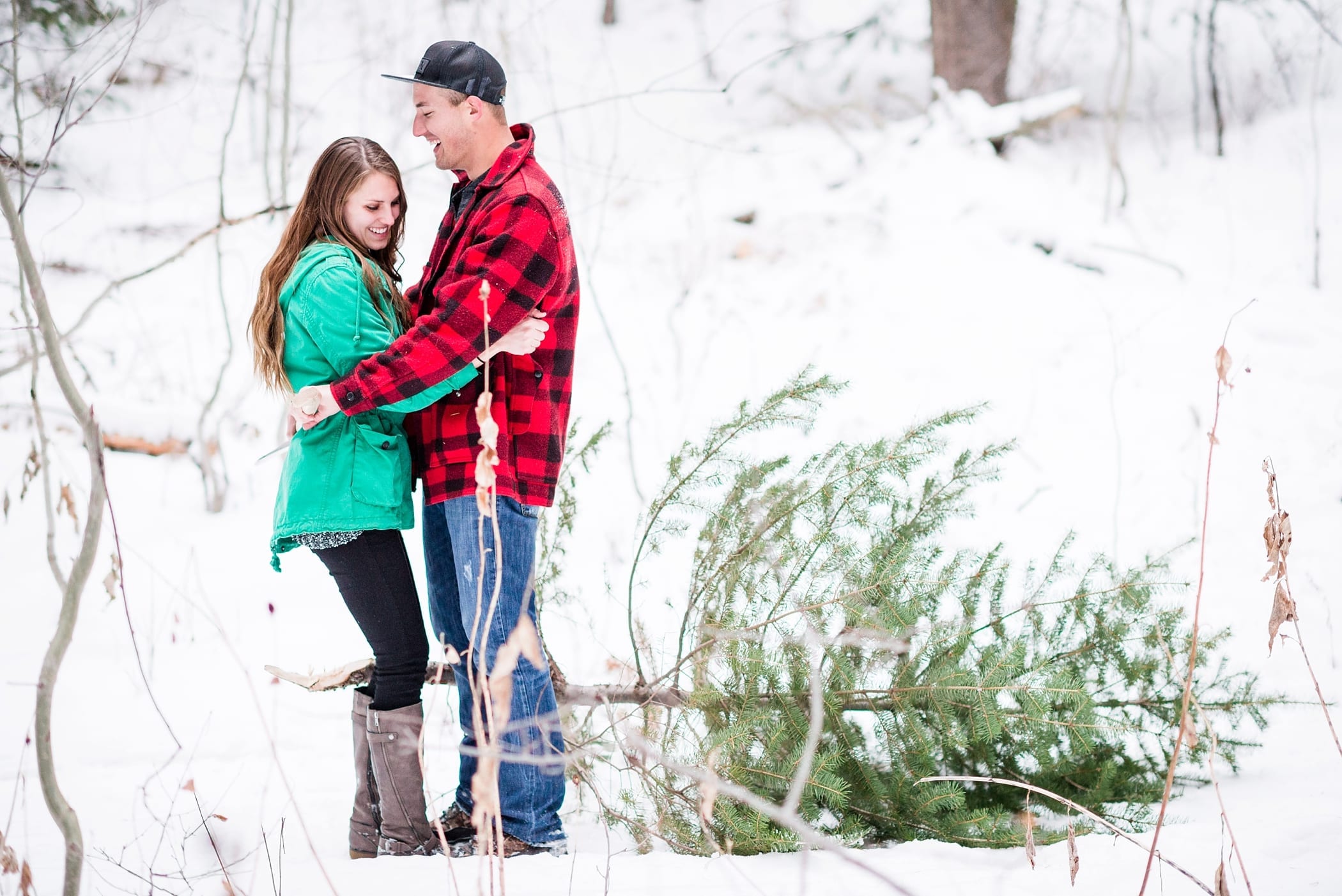 Cutting Down a Christmas Tree Anniversary Session by Michelle & Logan