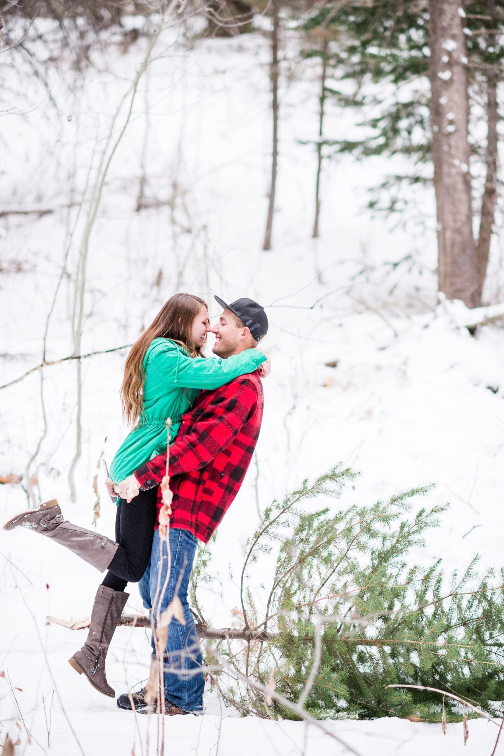 Cutting Down a Christmas Tree Anniversary Session by Michelle & Logan