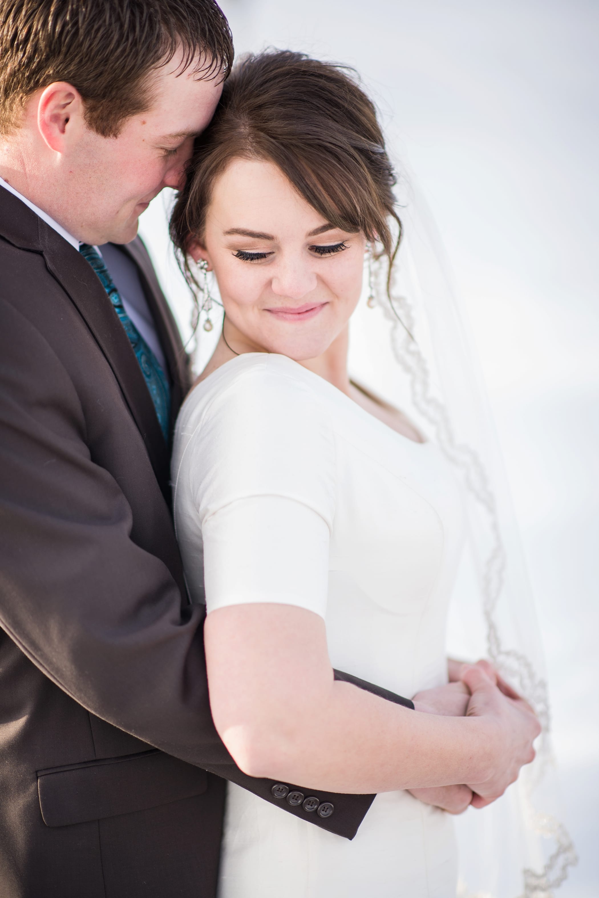 Rexburg Idaho LDS Temple bridal session in the winter by Michelle & Logan