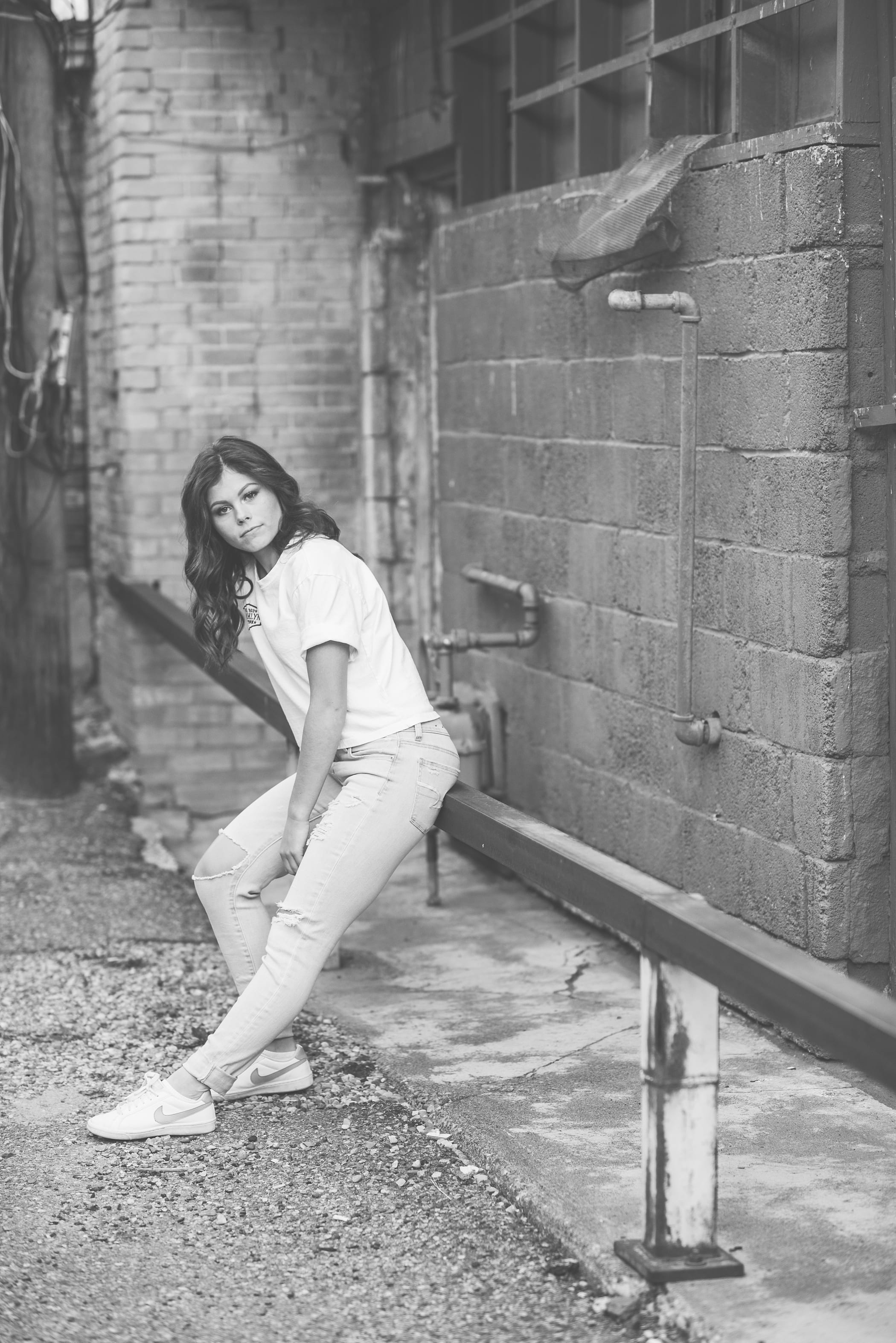 Downtown city alley senior girl by Michelle & Logan