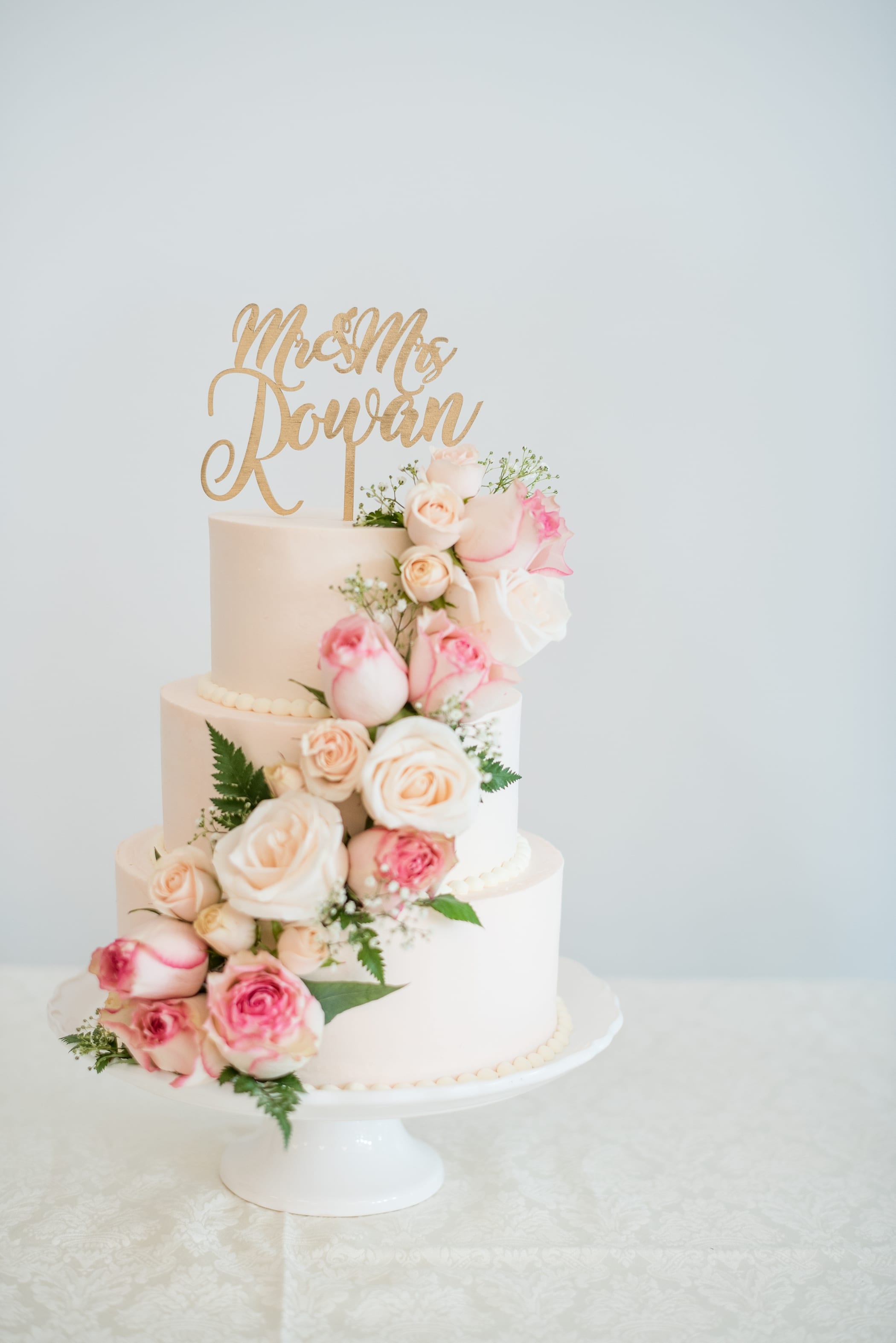 Simple white wedding cake • Blush and White Florals • Cake topper | Michelle & Logan Photo+Films