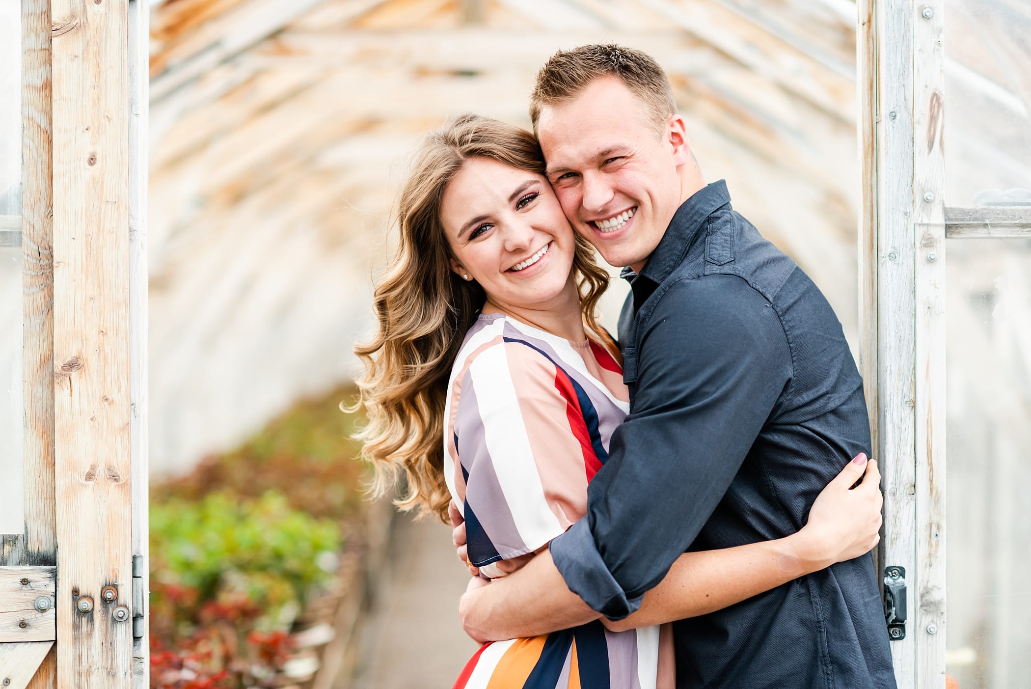Spring engagement session in a greenhouse
