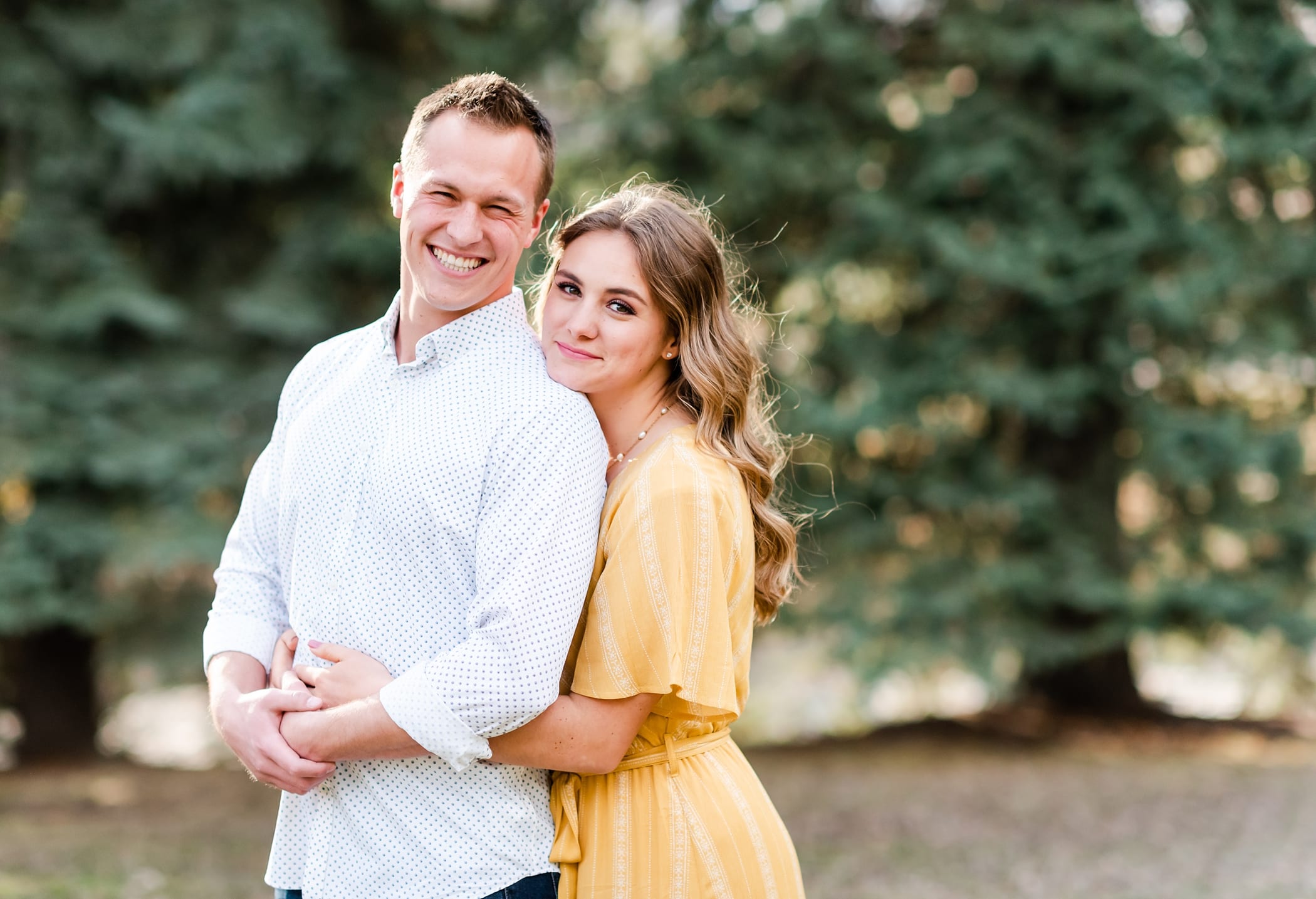 Spring engagement pictures in yellow dress